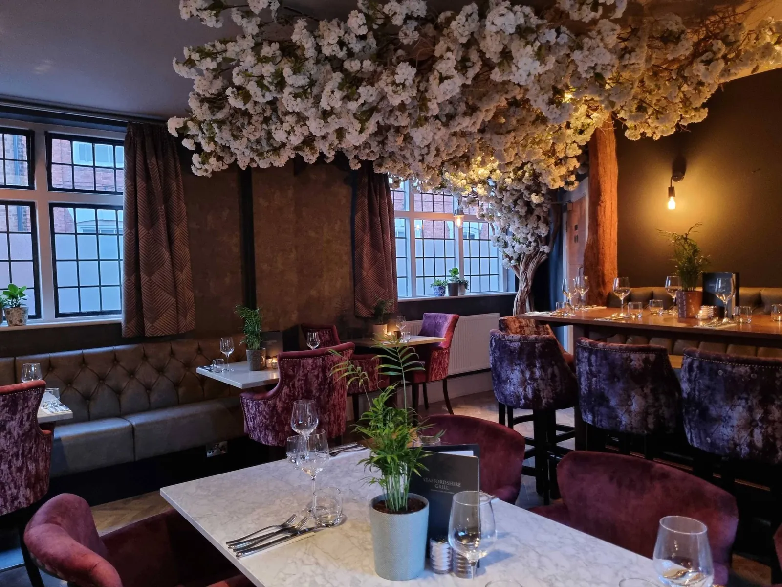 Blossom tree over the tables in the restaurant
